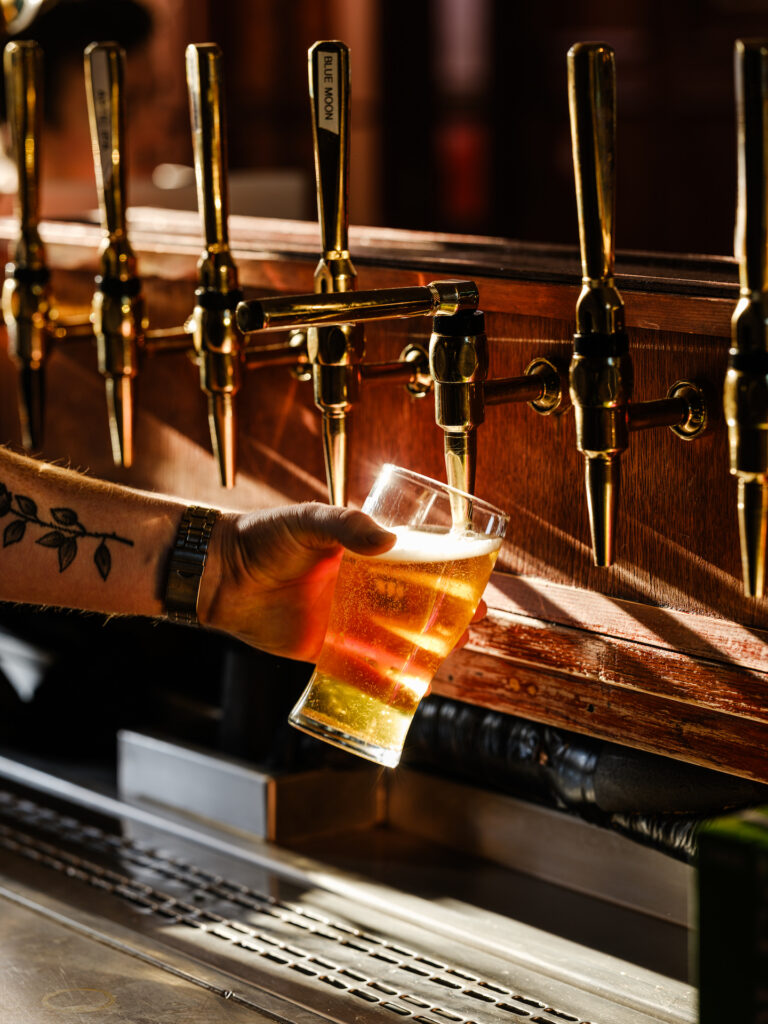 The Hound Pint Poured at the Bar